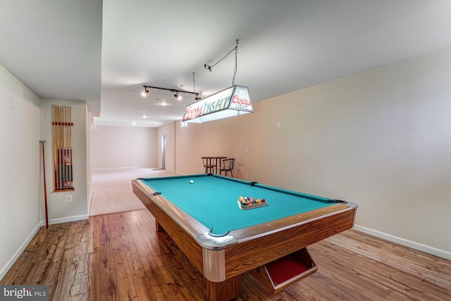 playroom featuring track lighting, billiards, baseboards, and wood-type flooring