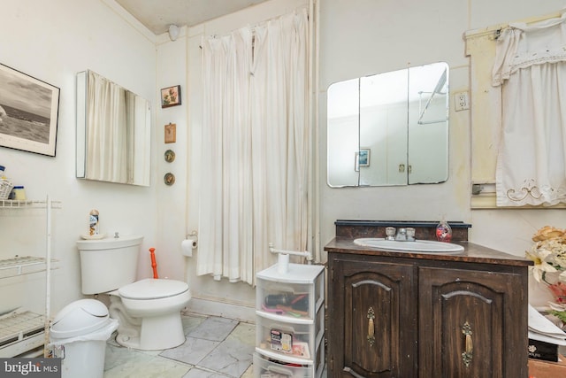 bathroom featuring marble finish floor, vanity, and toilet