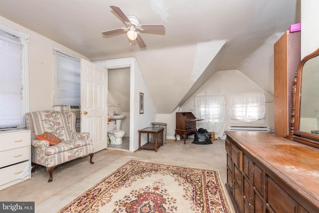 sitting room with vaulted ceiling and ceiling fan