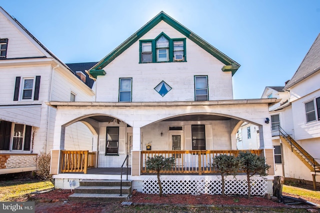 view of front of home featuring covered porch