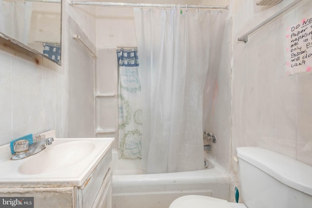 bathroom featuring toilet, shower / bathtub combination with curtain, and vanity