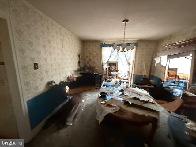 dining area featuring a chandelier