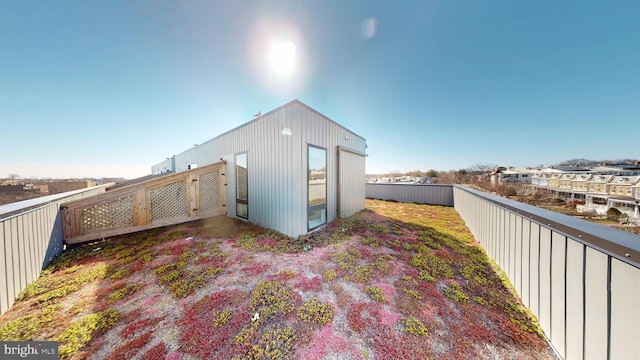 exterior space featuring an outdoor structure and a fenced backyard