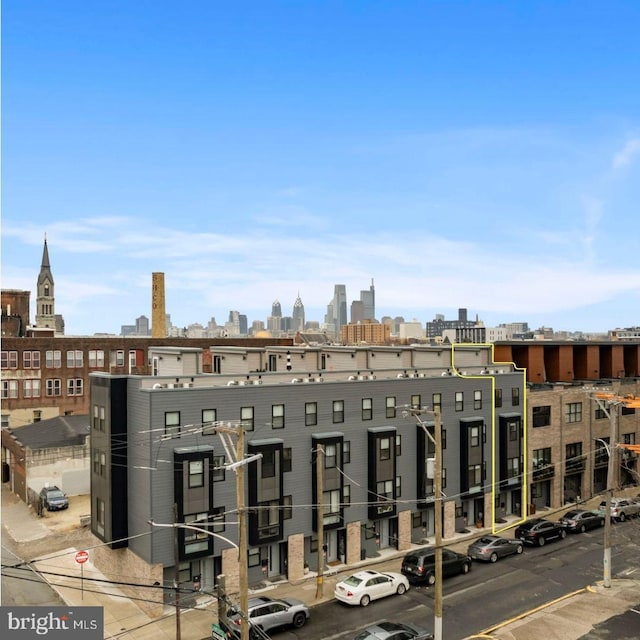 view of building exterior featuring a city view