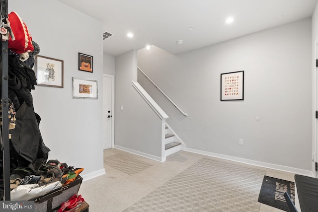 interior space with stairs, recessed lighting, baseboards, and visible vents