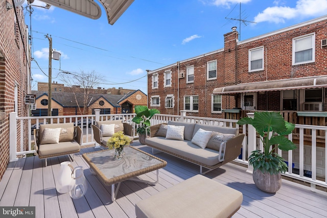 wooden deck with an outdoor hangout area