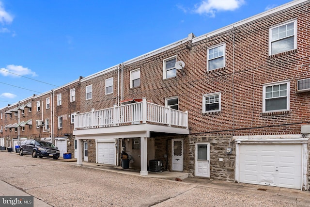 view of property with central AC