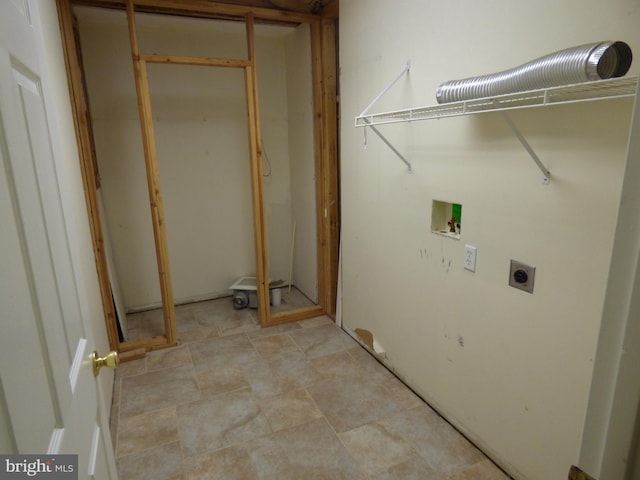 washroom with laundry area, hookup for a washing machine, and hookup for an electric dryer