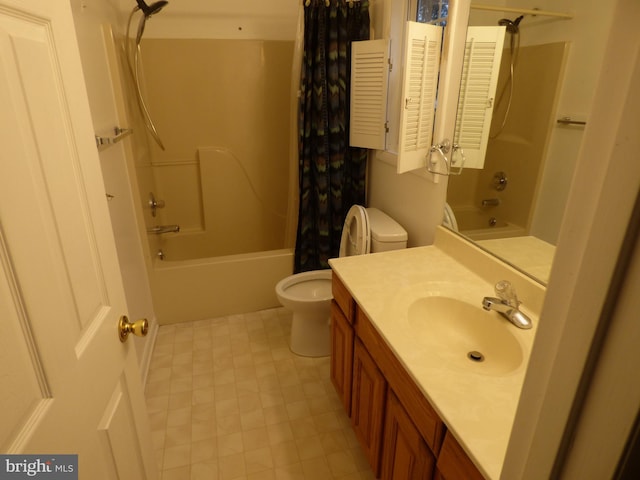 bathroom featuring toilet, shower / bath combo with shower curtain, and vanity