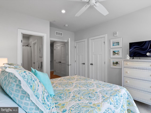 bedroom featuring a ceiling fan and visible vents