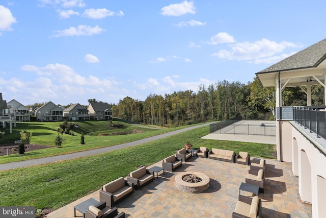 view of patio / terrace featuring an outdoor living space with a fire pit