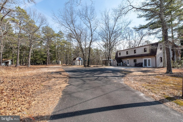 view of road with driveway