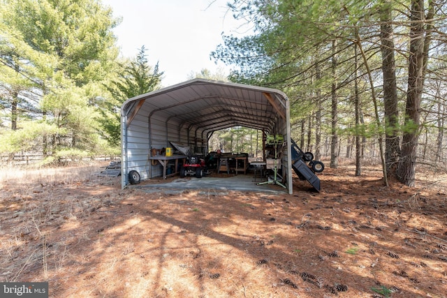 view of car parking with a carport and driveway