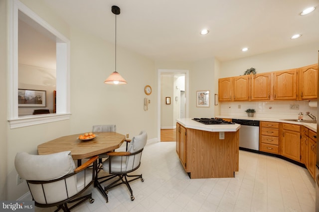 kitchen featuring a center island, light countertops, a sink, black gas stovetop, and dishwasher