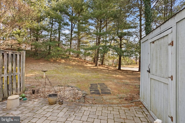 view of yard featuring a patio area and fence