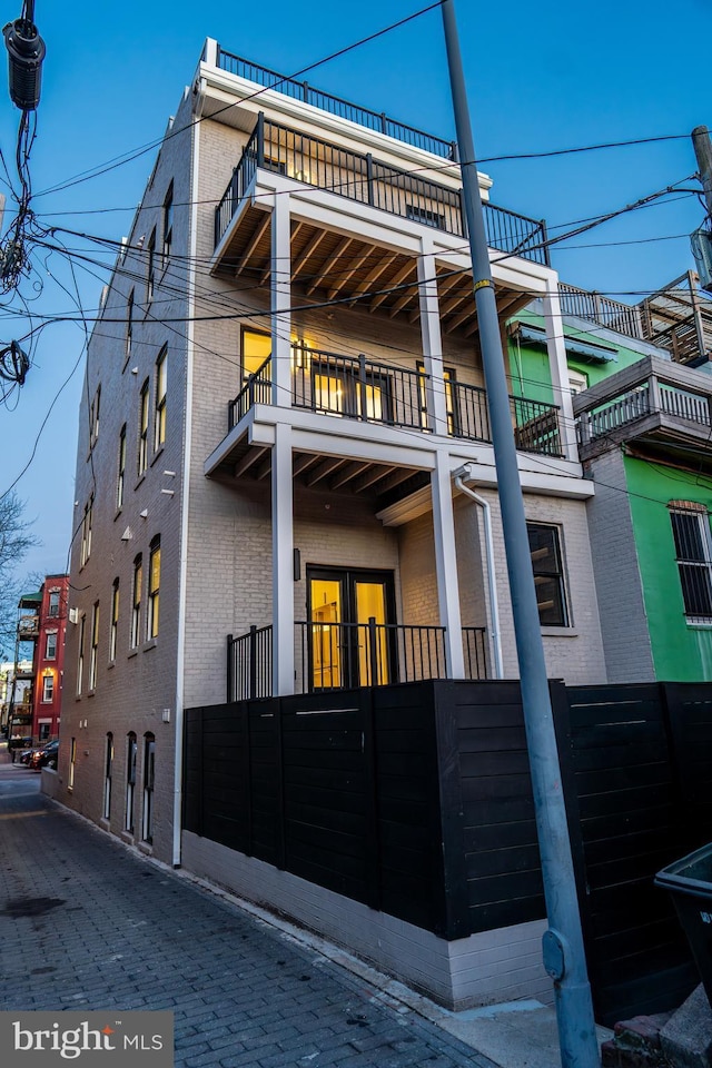 view of home's exterior featuring brick siding