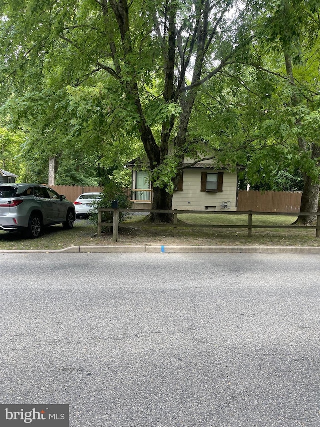 view of front of home with fence