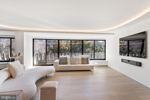2510 Virginia Ave NW Unit 512-S, Washington, DC 20037 - living area featuring wood finished floors and healthy amount of natural light