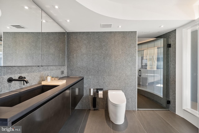 2510 Virginia Ave NW Unit 512-S, Washington, DC 20037 - full bathroom featuring vanity, tile walls, and a shower stall
