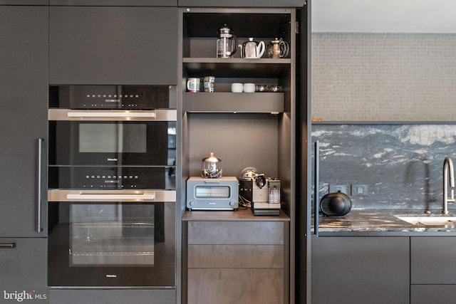 2510 Virginia Ave NW Unit 512-S, Washington, DC 20037 - bar area featuring stainless steel double oven and a sink