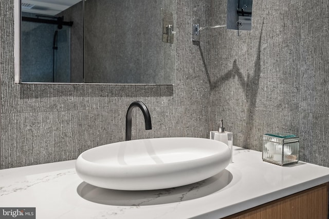 2510 Virginia Ave NW Unit 512-S, Washington, DC 20037 - bathroom with tile walls and vanity