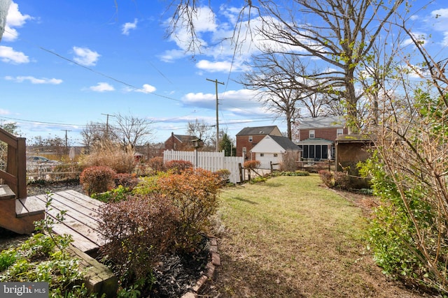 view of yard with fence