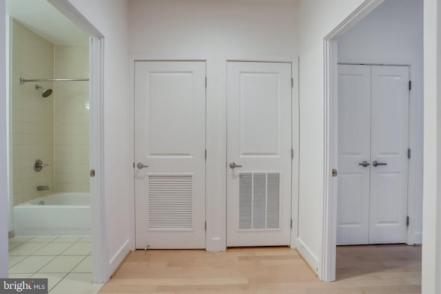 interior space with visible vents and light wood-style floors