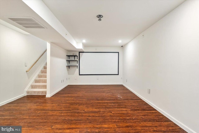 home theater room featuring recessed lighting, visible vents, baseboards, and wood finished floors