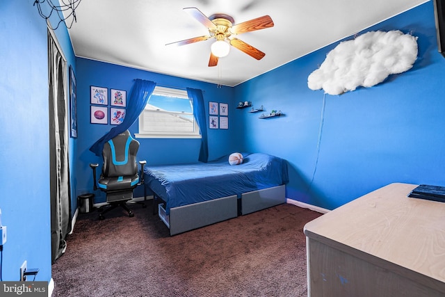 carpeted bedroom featuring ceiling fan and baseboards