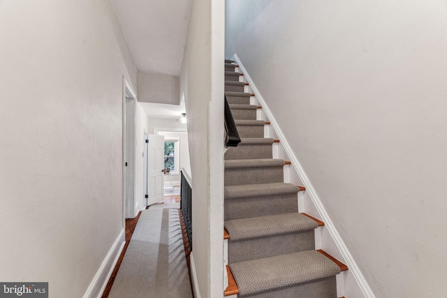 staircase with baseboards