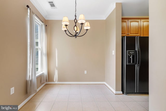 unfurnished dining area featuring a healthy amount of sunlight, visible vents, and ornamental molding