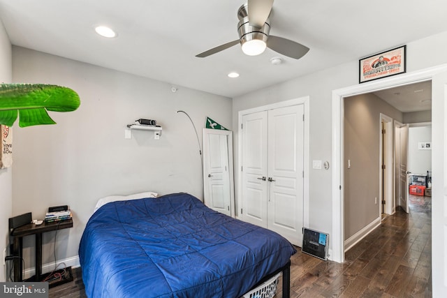 bedroom with recessed lighting, a closet, ceiling fan, wood finished floors, and baseboards