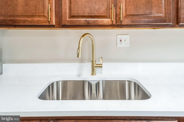 interior details featuring a sink