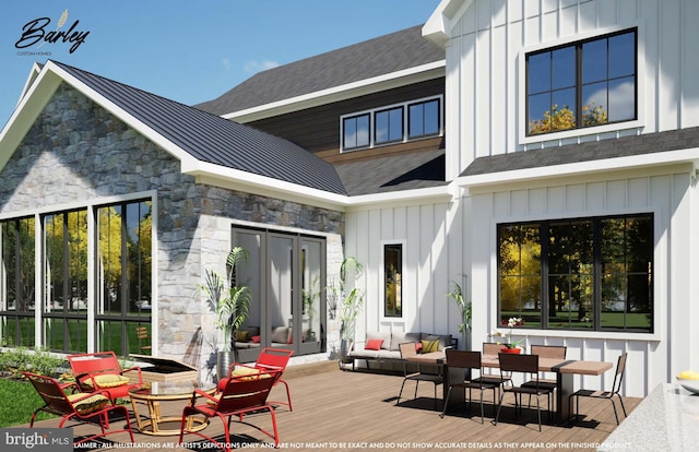 back of property with outdoor dining area, board and batten siding, a standing seam roof, a deck, and stone siding