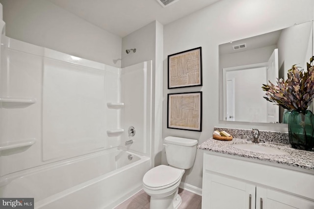 bathroom with shower / bathtub combination, visible vents, toilet, vanity, and baseboards