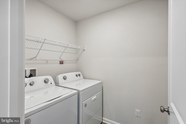 laundry room with laundry area and washer and dryer