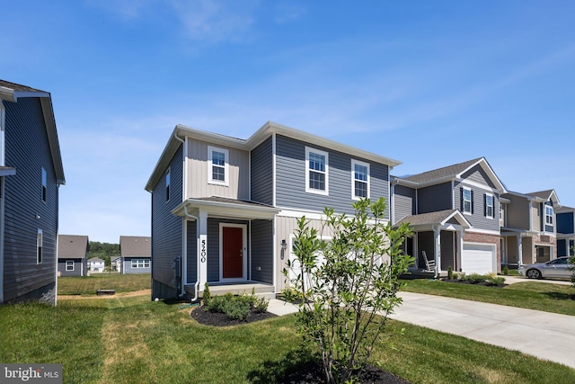 view of front facade with a garage, concrete driveway, a residential view, a front lawn, and board and batten siding