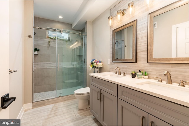 2525 N Hancock St, Philadelphia, PA 19133 - bathroom with a sink, toilet, and a shower stall
