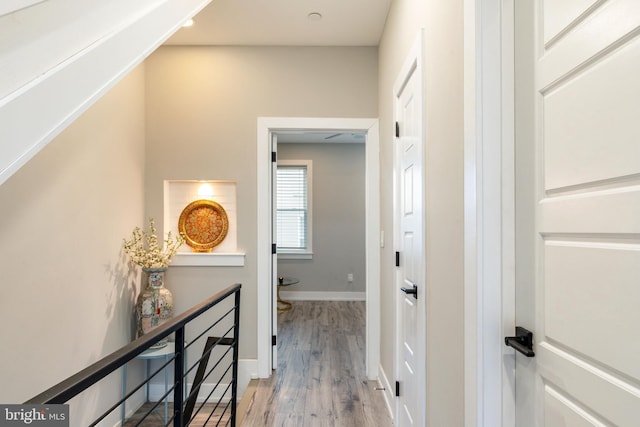 2525 N Hancock St, Philadelphia, PA 19133 - corridor featuring an upstairs landing, light wood-style flooring, and baseboards