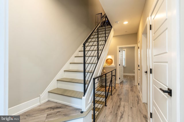 2525 N Hancock St, Philadelphia, PA 19133 - stairs with recessed lighting, wood finished floors, and baseboards