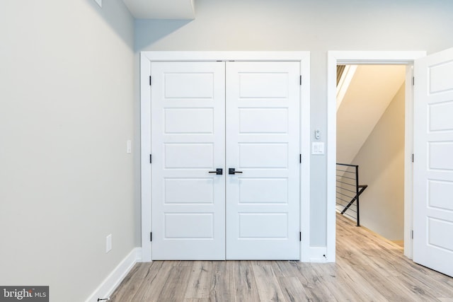 2525 N Hancock St, Philadelphia, PA 19133 - unfurnished bedroom featuring light wood finished floors, a closet, and baseboards