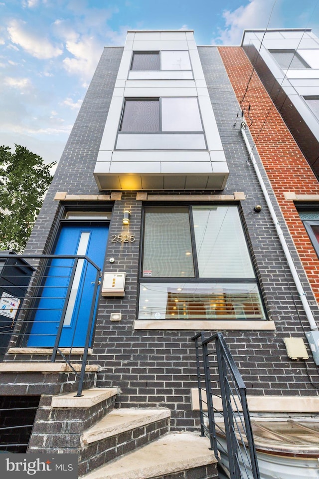 2525 N Hancock St, Philadelphia, PA 19133 - view of front of home featuring brick siding