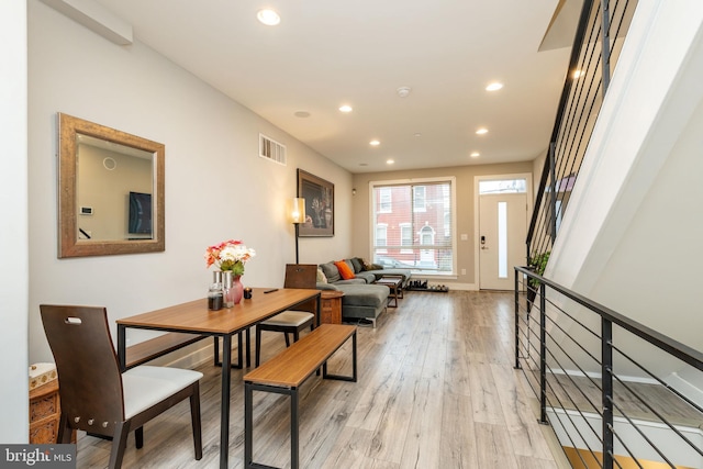 2525 N Hancock St, Philadelphia, PA 19133 - dining room featuring light wood finished floors, stairs, visible vents, and recessed lighting