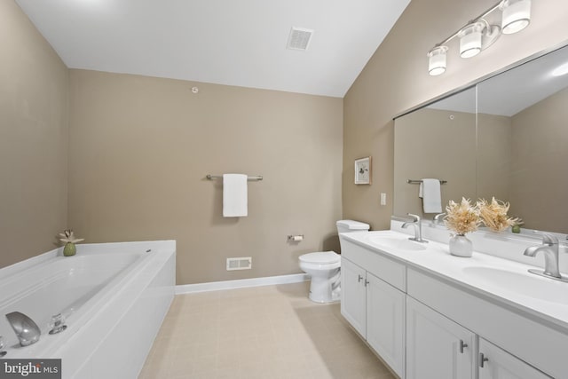 bathroom featuring toilet, baseboards, a sink, and a bath