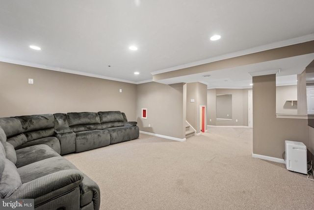 living room featuring carpet, ornamental molding, baseboards, and recessed lighting