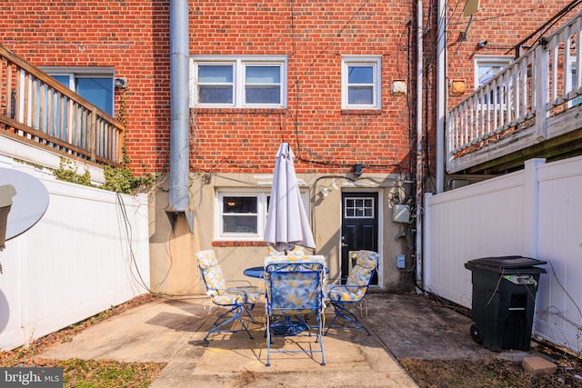 view of patio / terrace with fence