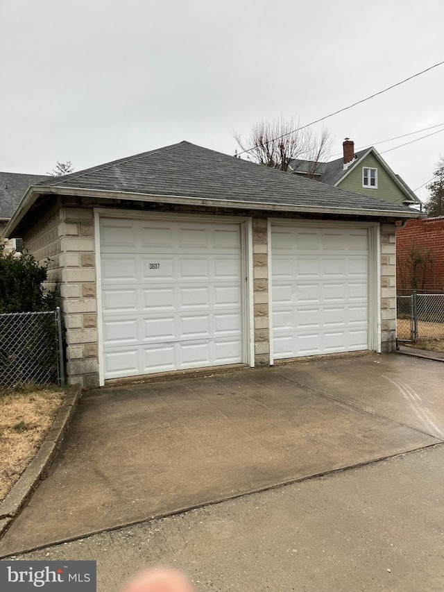 detached garage with fence