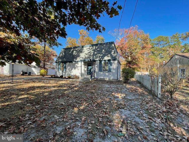 view of front of house with fence