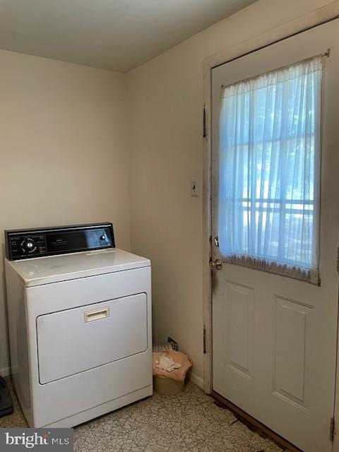 laundry area featuring washer / clothes dryer and laundry area