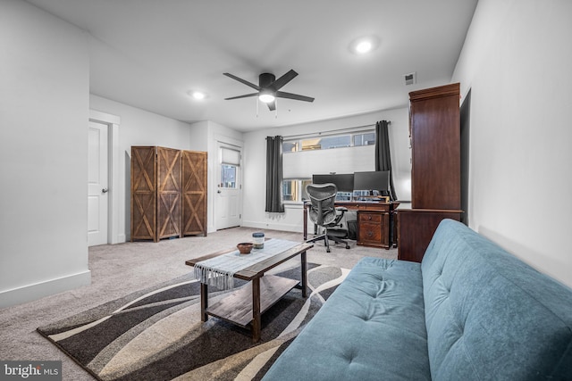 carpeted office space with a ceiling fan, recessed lighting, visible vents, and baseboards